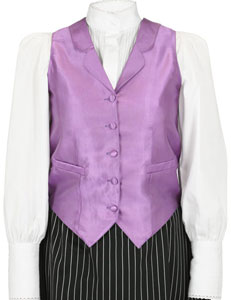 This well-appointed ladies vest is made of a finely woven satin fabric with micro stripes and is accented with white stitching, you’ll seem to sparkle subtly under the lights The vest is self-backed, features rounded lapels, and five fabric covered buttons to fasten up the front. Two inset waist pockets provide space for a lady’s must-haves such as a delicate hankie or silver compact. Adjustable ties in the back create a custom fit and pin tucks in the front create a flatering ladies silhouette. | Spur Western Wear